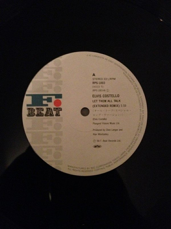 Elvis Costello & The Attractions : Let Them All Talk (12", Single)