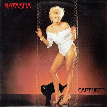 Natasha England : Captured (LP, Album)