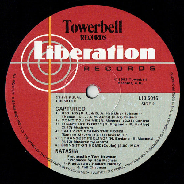 Natasha England : Captured (LP, Album)