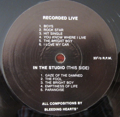 Bleeding Hearts (2) : What Happened? (12", Album + 7")