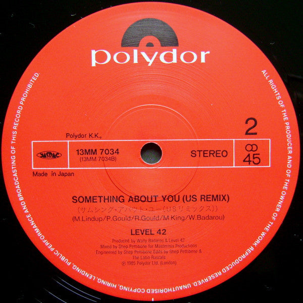 Level 42 : Lessons In Love / Something About You (12", Ltd)