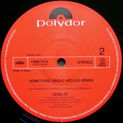 Level 42 : Lessons In Love / Something About You (12", Ltd)