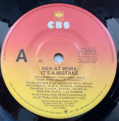 Men At Work : It's A Mistake (7", Single)