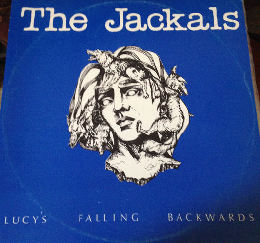 The Jackals (7) : Lucy's Falling Backwards (12", Blu)