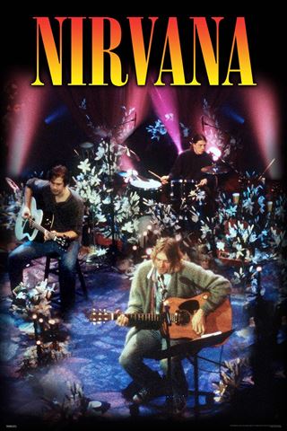 Nirvana band performing on stage in TV studio with colorful lights
