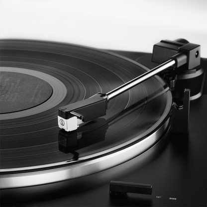 audio technica LP60xbt usb and bluetooth turntable in black close up of arm and cartridge